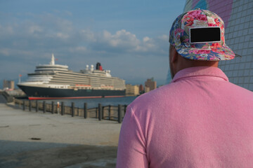 Classic ocean liner cruiseship cruise ship Elizabeth in port of Aomori, Japan with skyscraper...