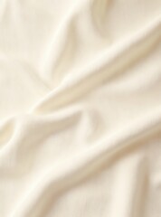 Fototapeta premium Ivory fabric with soft folds and smooth texture