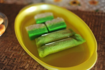 Kuih Dadar (green-coloured folded omelette or pancake made of rice flour) and  Kuih Talam Pandan...
