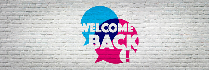 Welcome back on brick wall background	