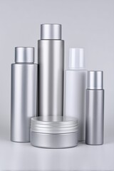 Collection of white and silver skincare containers mockup in various shapes and sizes