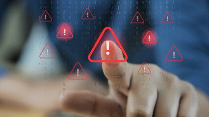  hand interacts with a virtual screen filled with red warning icons, symbolizing system hacking, cybersecurity threats, malware attacks, and digital security breaches in a high-risk tech environment.