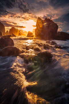 sunset on the beach at Pantai Gigi Hiu Kelumbayan Lampung Indonesia