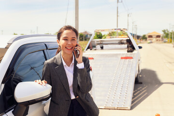 Smile relieve worries asian businesswoman car broke down while traveling uses smartphone contact...