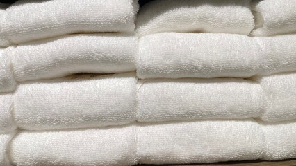stack of a white towel bathroom on wooden background