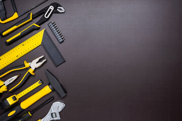 Set of hand tools on a dark background
