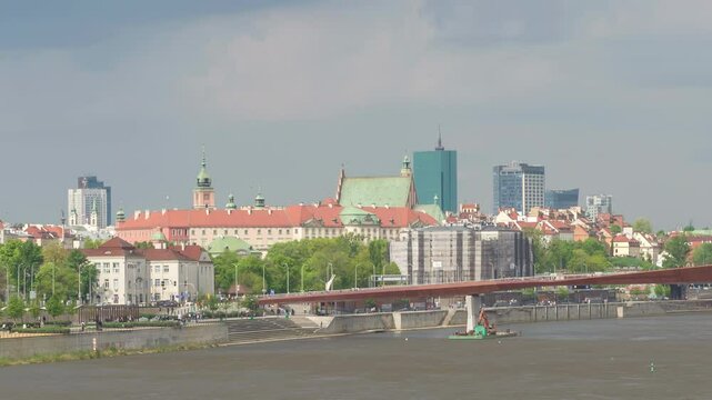 Warsaw Poland time lapse city skyline at Praga Footbridge and old town