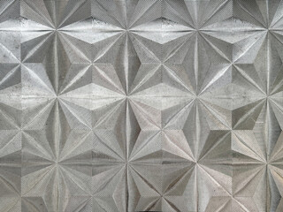 Obraz premium Close up of decorative textured glass in star geometric pattern. Repeated geometrical pattern on translucent glass surface. Seamless background texture.