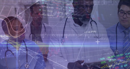Holding tablet, doctor in lab coat leading medical team analyzing data in hospital lab, with charts