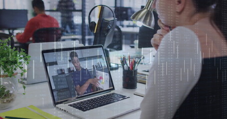 Leaning business casual woman conducting online call at office desk with laptop, copy space