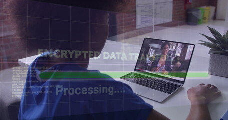 Working clinician in blue scrubs typing on laptop at desk, with encrypted data overlay, copy space