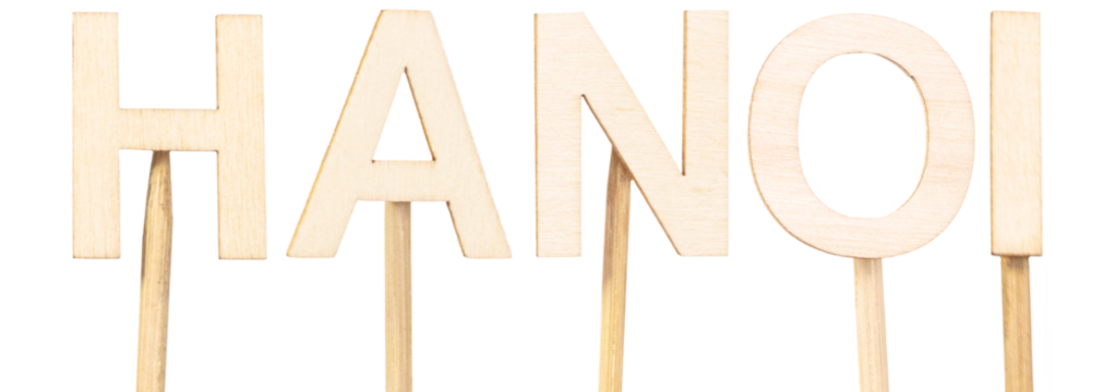 Hanoi, capital of Vietnam, composed with thick wooden letters on neutral background, conceptual design evoking Asian culture