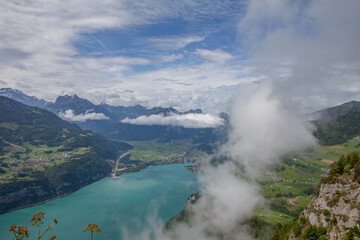 Summer Landscape in Amden, Swiss Alps, with Lake Walensee and Low Clouds
