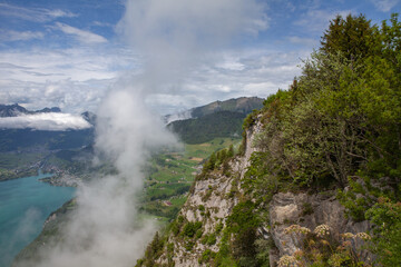 Summer Landscape in Amden, Swiss Alps, with Lake Walensee and Low Clouds
