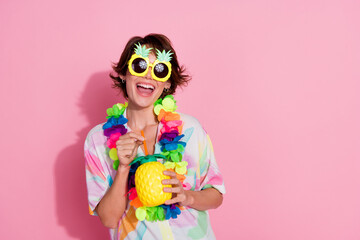 Portrait of nice young lady pineapple juice empty space wear shirt isolated on pink color background