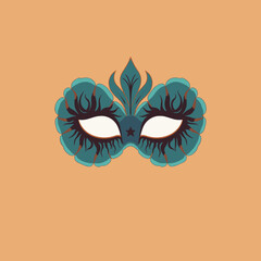 Decorative mask design with floral patterns on orange background  