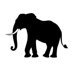 Silhouette of a standing elephant with raised trunk