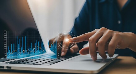 Analyzing business data charts on laptop for financial planning and investment strategy success online