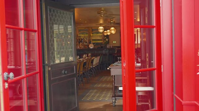 France, Paris, 24.06.2025: The most popular historical district of Paris Montmartre with its color, entertainment and many tourists from all over the world in the spring