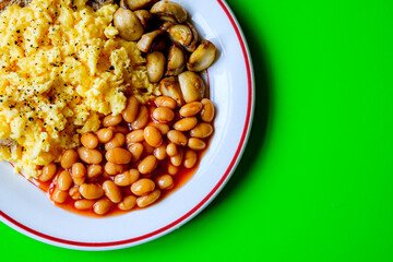 Scrambled Eggs Fried Mushrooms Baked Beans and Tomato Sauce