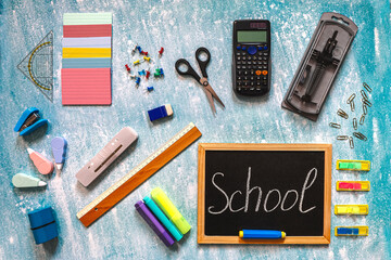 School Chalkboard with Office Supplies. 