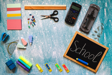 Tilted School Blackboard with Supplies