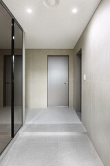 The door leading to the attic is also in a stylish silver color