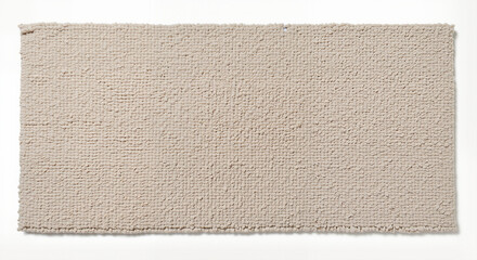 Textured beige rug with soft fibers on a light background for home decor concept