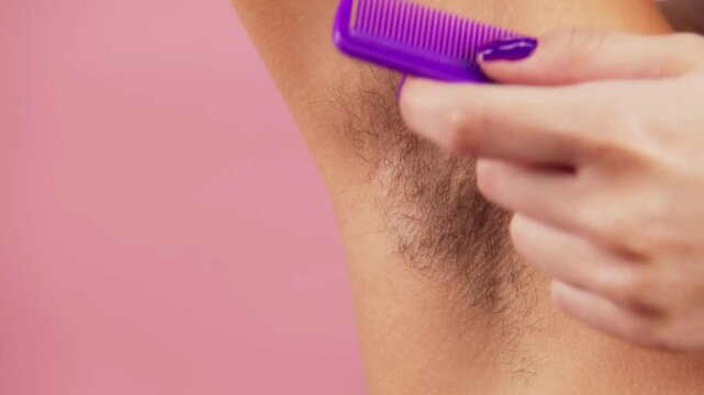 Woman Hand Combing Armpit Hair &ndash; Body Positivity   