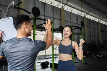 Personal Trainer and Client Engaging in Fitness Session