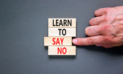 Learn to say no symbol. Concept words phrase Learn to say no on beautiful wooden blocks. Beautiful...