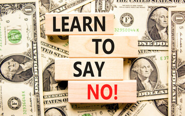 Learn to say no symbol. Concept words phrase Learn to say no on beautiful wooden blocks. Dollar...