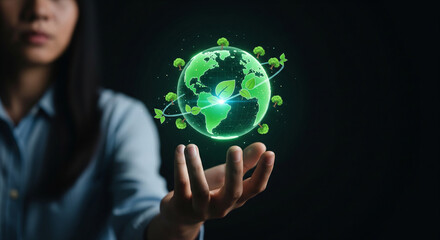 Sustainable Future and Green Energy Technology Concept.
A woman holding a glowing green planet with eco icons, representing global sustainability and environmental responsibility.