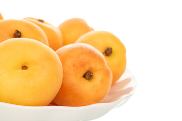 Sweet organic apricots isolated on white background, close-up.