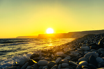 The sunrise at the beach of Curium