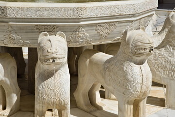 detail of the fountain of the lions in the alhambra of granada