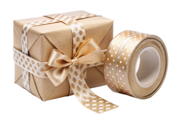 Beige gift box with gold ribbon bow and polka dot ribbon roll isolated on a transparent background present
