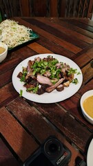 Grilled pork is on the plate 