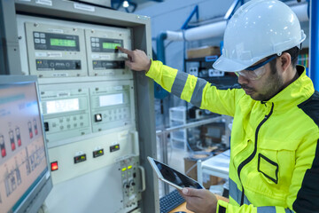 Engineer working at control room,Manager control system,Technician man monitoring program from a lot of monitor