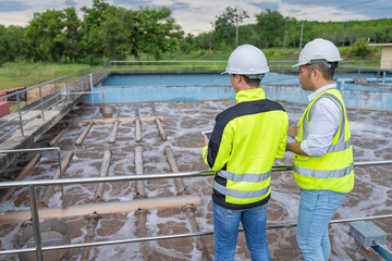 Environmental engineers work at wastewater treatment plants,Water supply engineering working at...
