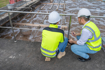 Environmental engineers work at wastewater treatment plants,Water supply engineering working at Water recycling plant for reuse