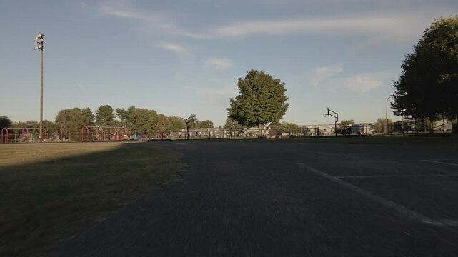 Strolling through a serene park at dusk
