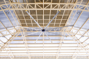 HVLS big fan under metal roof beam structure with heat insulation ceiling of large multipurpose...