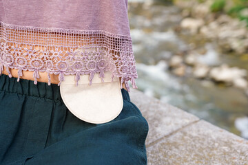 Close-up of an ostomy bag outside. World cancer day