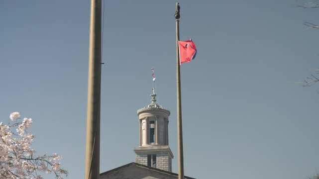 City center flag atop historic building