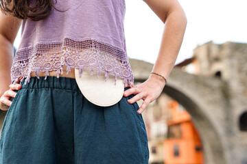 Unrecognizable Young Woman with an Ostomy in Rural Life