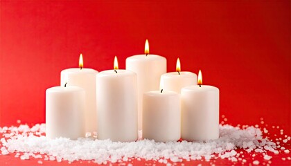 Christmas candles on red background