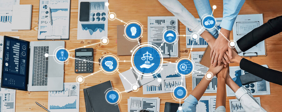 A professional team collaborates during a business ethics meeting, utilizing digital tools and visual data to enhance decision-making and promote transparency in the workplace. Amity - Powered by Adobe