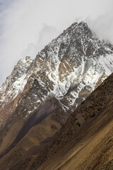 Majestic snow-covered Kyrgyzstan mountains in serene daytime setting