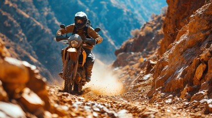 Obraz premium Rider on a Cross-Country Enduro Motorcycle Going Fast, Thrilling Enduro Racing with Drift Action, Motocross Moto Sport Adventure Isolated on Background with Copy Space. Motorsport Concept. 